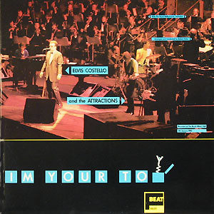Elvis Costello And The Attractions* With The Royal Philharmonic Orchestra* - I'm Your Toy (12", Single, Ltd)